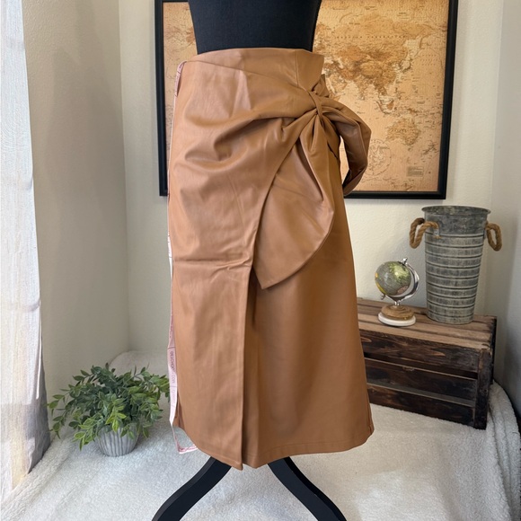 Choosy Dresses & Skirts - Choosy brand brown faux leather midi wrap skirt with a side bow detail